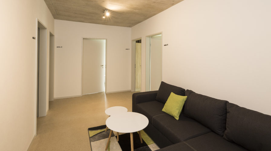 Gemeinschaftsraum und Gästezimmer